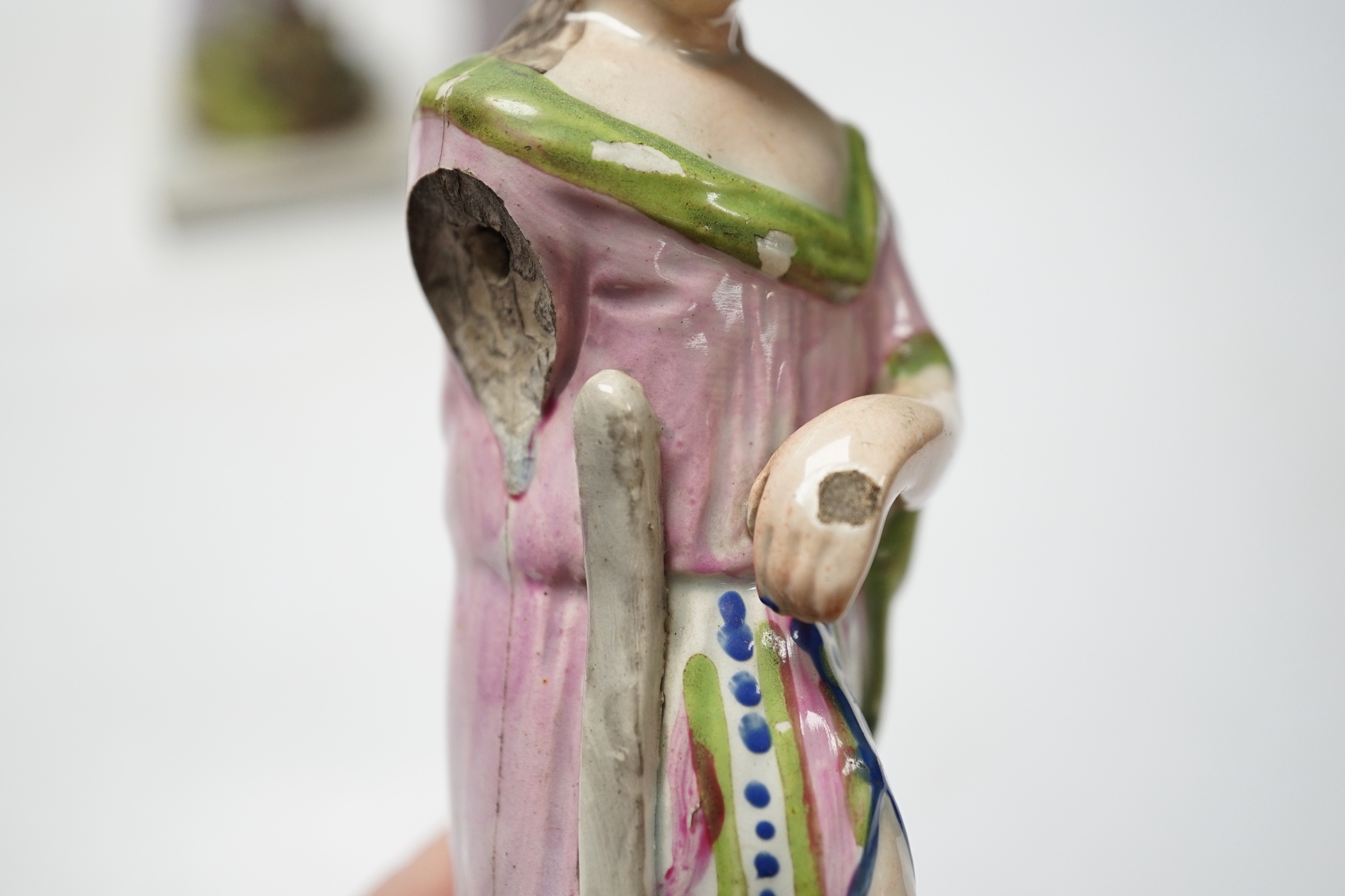 A set of three pearlware figures of Faith, Hope and Charity, c.1810, largest 21cm high